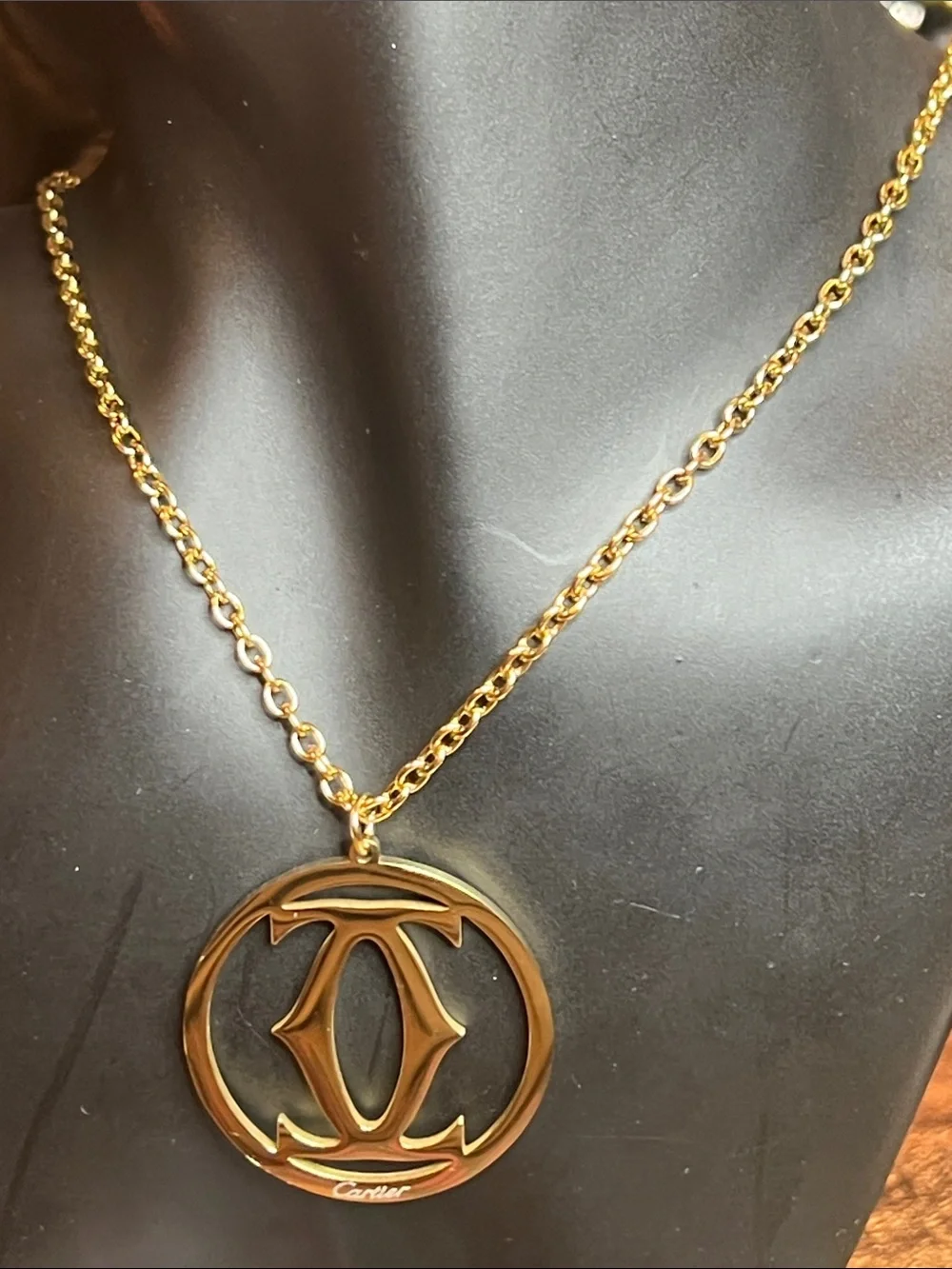 Gold and Black Circular Logo Pendant Necklace